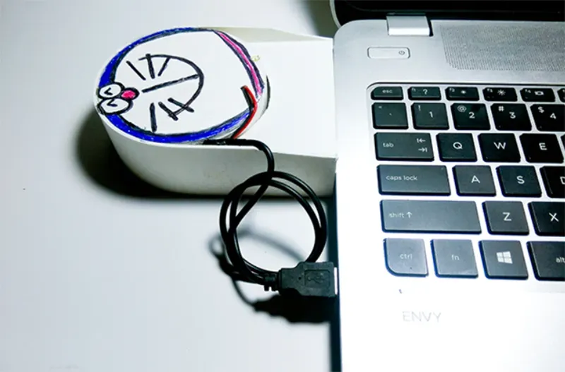 Hình ảnh minh họa nguyên lý luồng gió và góc nâng tối ưu của laptop khi sử dụng quạt tản nhiệt chế